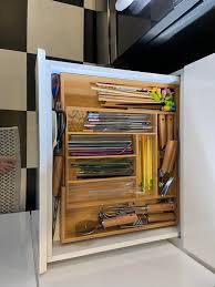 How to organize a small kitchen with 1 drawer and open cabinets?